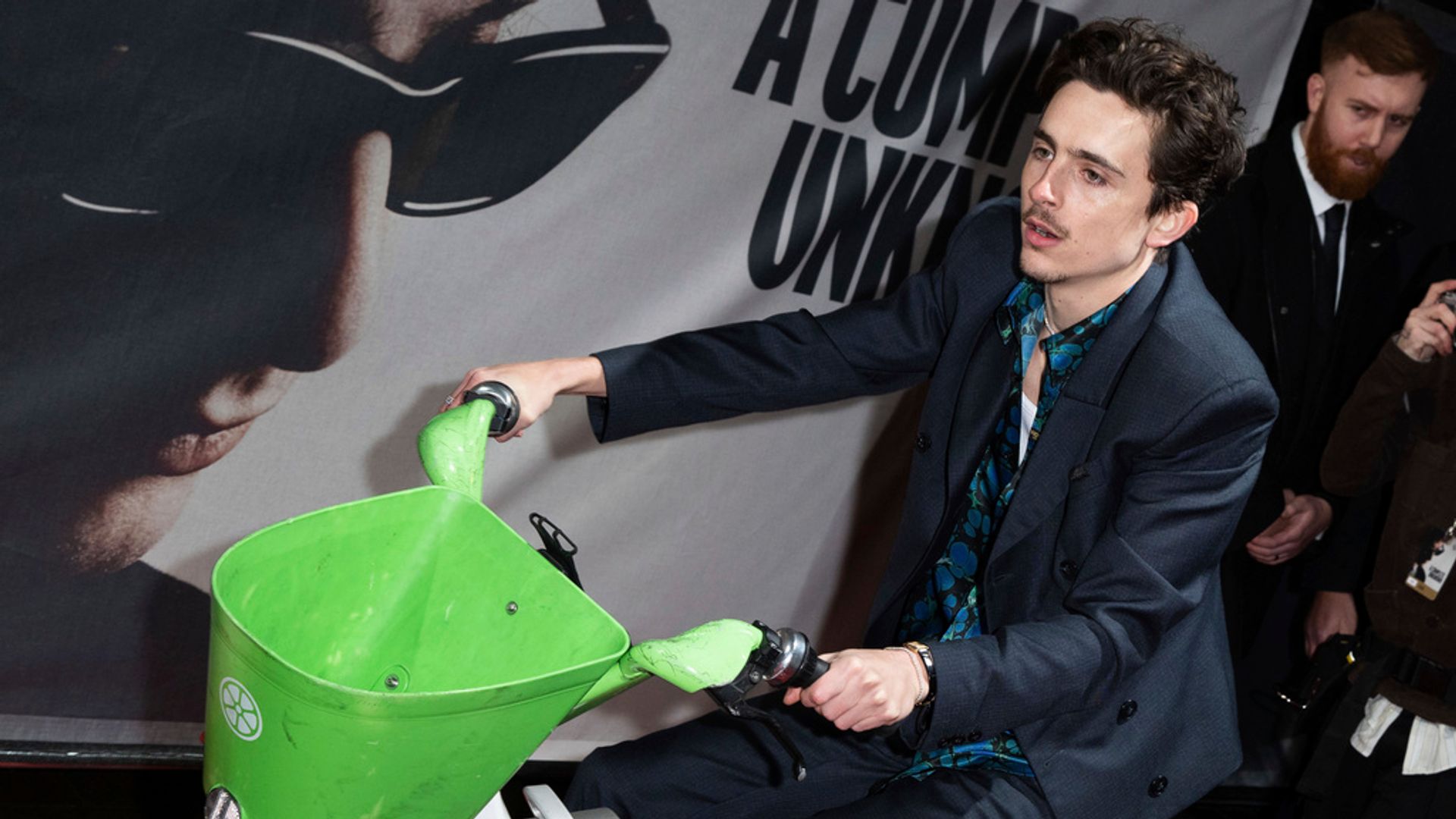 Timothee Chalamet arrives at London film premiere on a Lime bike