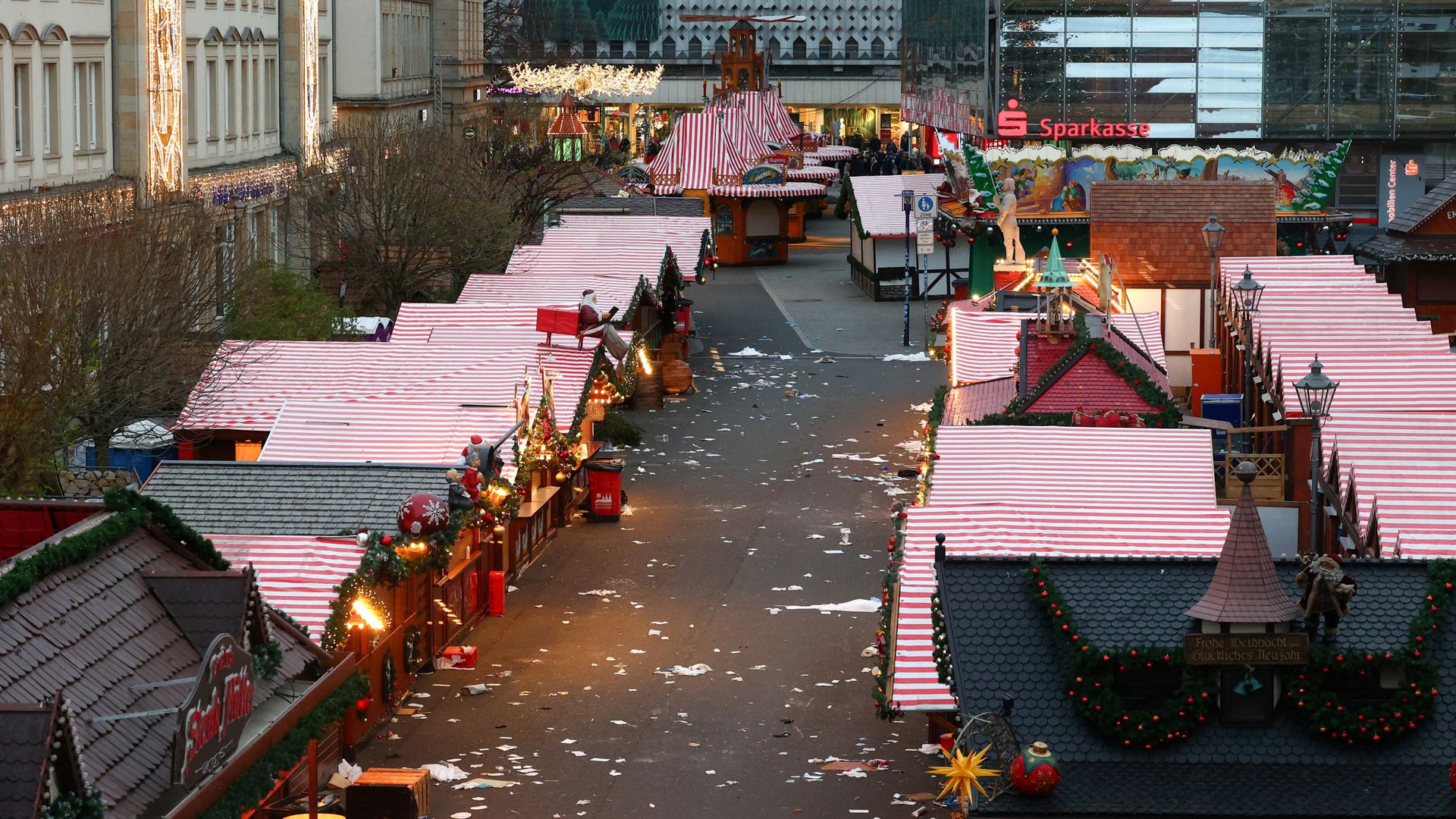 Memorial service held after Christmas market attack - as police say four women among those killed