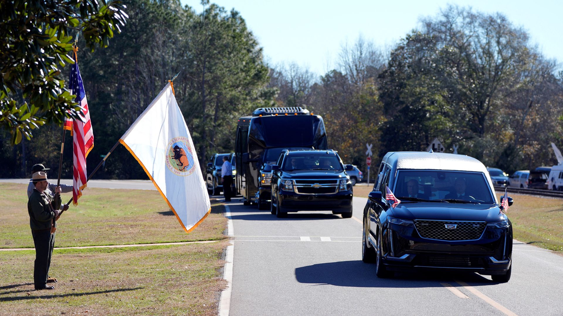 Jimmy Carter's six-day state funeral starts with procession - as mourners gather for service