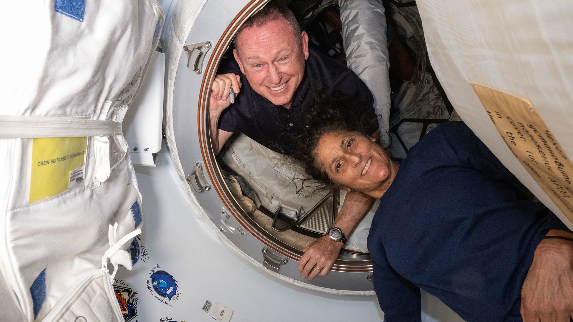 Two astronauts stuck in space for more than nine months head back to Earth